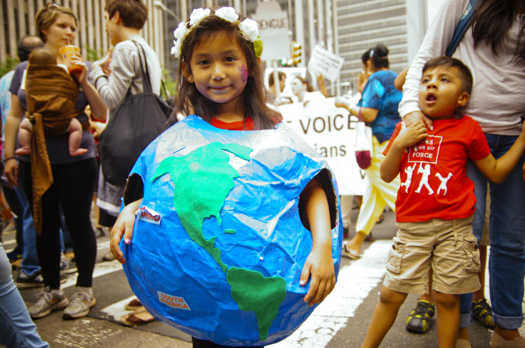 Little girl at the People's Climate March, 2014 - photo by Joe Brusky via Flickr