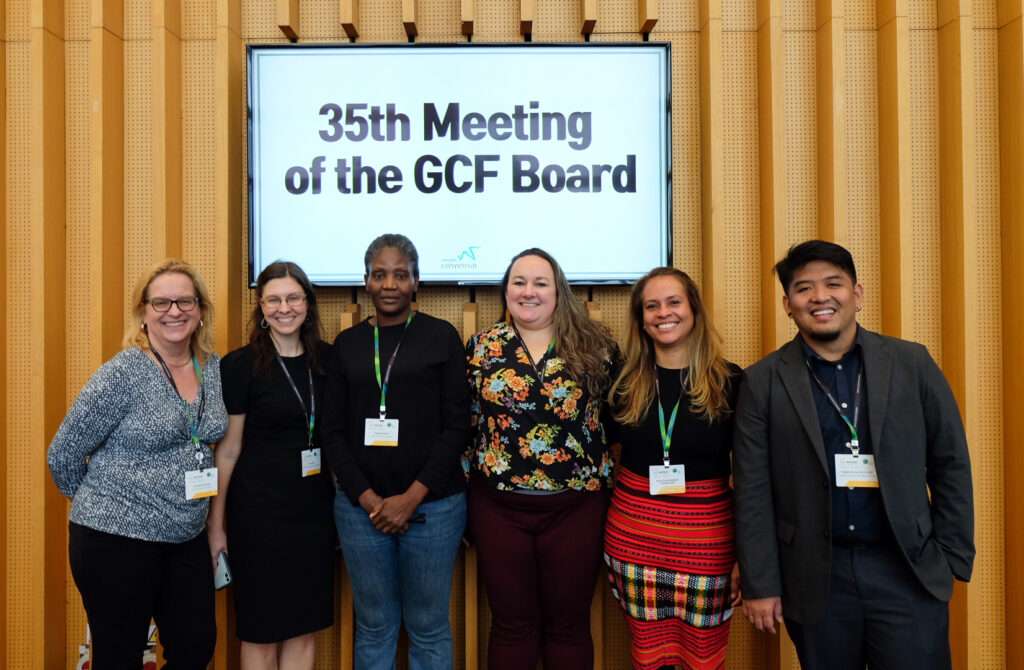 Civil Society Advocates, including CIEL Senior Attorney Erika Lennon, stand together at the 35th meeting of the GCF board.